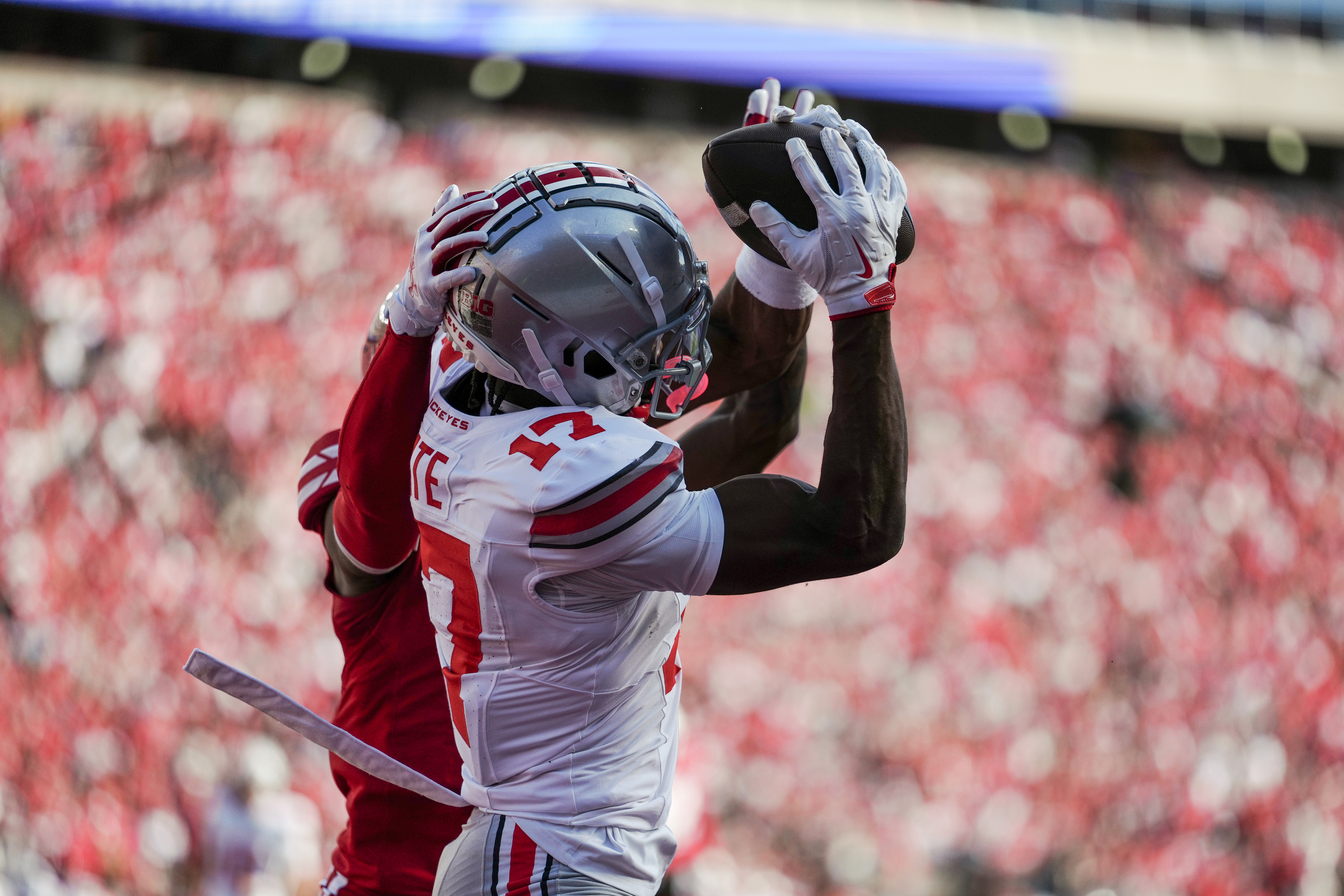 Oct 18, 2025; Madison, Wisconsin, USA; Ohio State Buckeyes wide receiver Carnell Tate (17) catches a touchdown pass in the first half against the Wisconsin Badgers at Camp Randall Stadium on October 18, 2025 in Madison, Wisconsin. Photography by Ross Harried for Second Crop Sports.